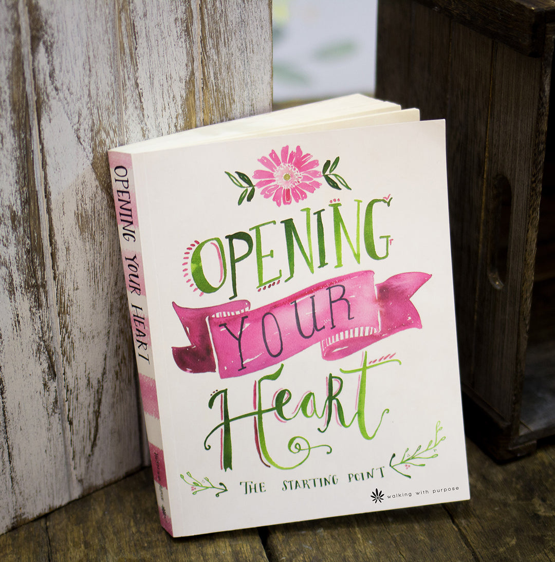 Opening Your Heart Bible Study propped against a wooden box
