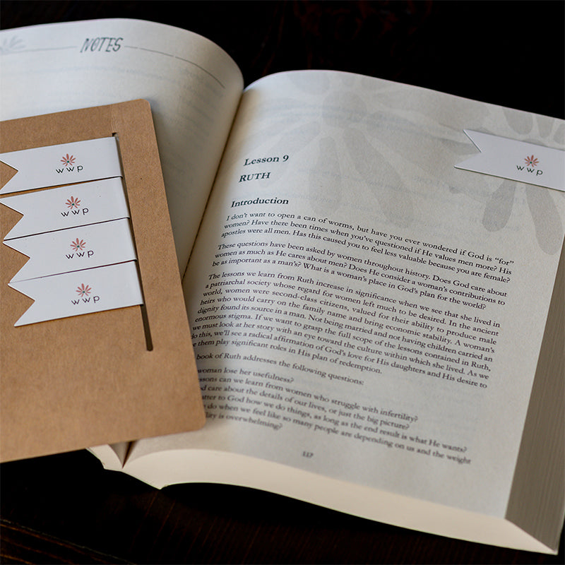 Walking with Purpose Magnetic Bookmarks designed with the signature WWP flower logo. One bookmark is on Bible study page. Remaining four bookmarks in the background.