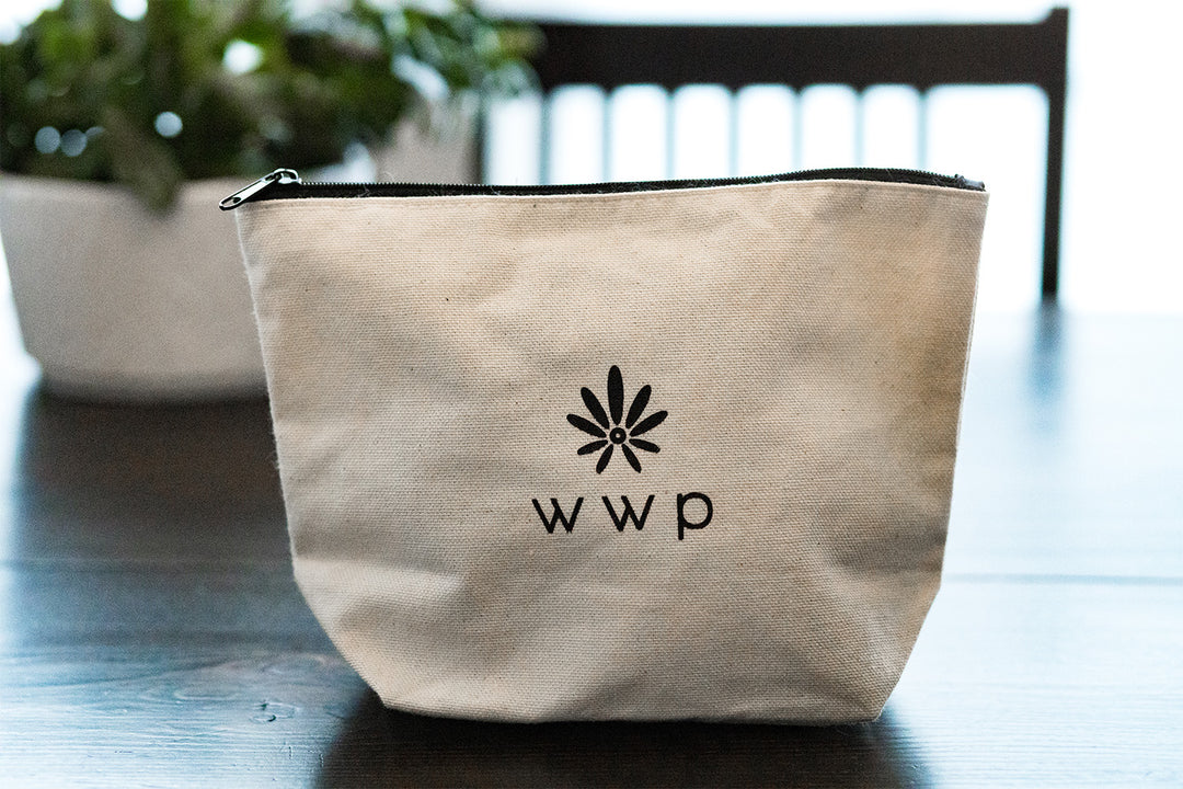 St Therese canvas pouch with WWP logo on back