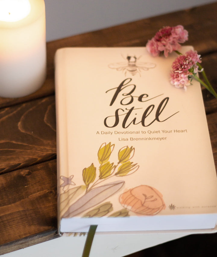 Be Still 365-Day Devotional to Quiet Your Heart on a table