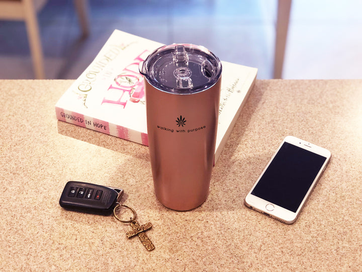 WWP Travel Beverage Container on table with Bible study